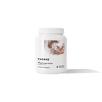Thorne chocolate Whey Protein Isolate tub standing upright