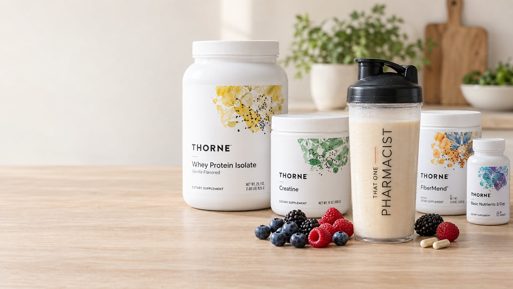 Vanilla shake with blueberries, raspberries, blackberries, two Basic Nutrients 2/Day capsules and Thorne products in warm morning light